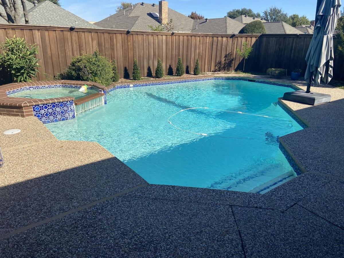 Clear, clean backyard pool and spa