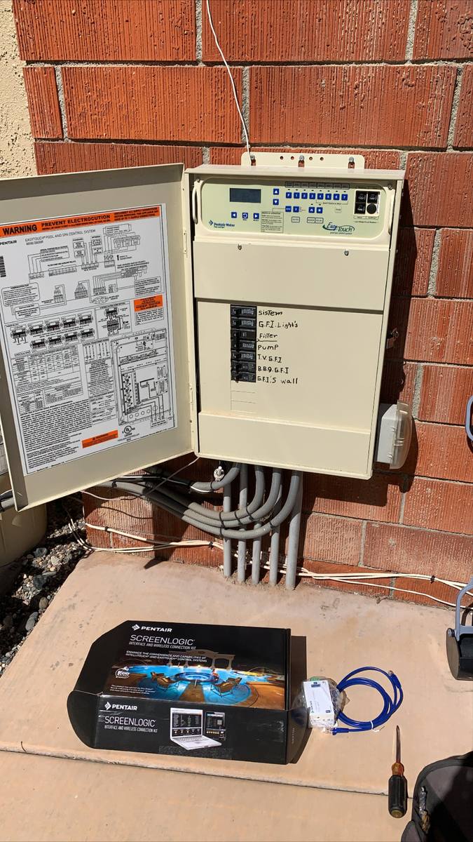 Pool automation control panel on an equipment pad
