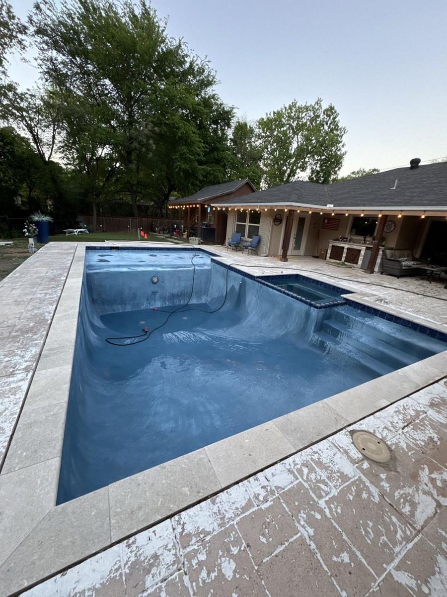 Drained pool with a new interior finish, before refill